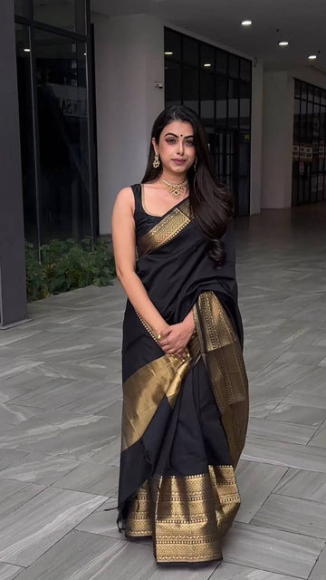 Angelic Black Soft Lichi Silk Saree With Devastating Blouse Piece