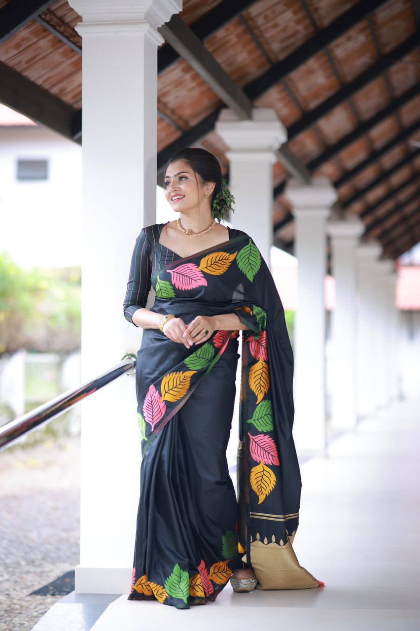 Leafy Black Soft Lichi Silk Saree With Devastating Blouse Piece